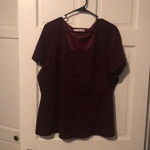 Peplum top with black details